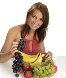 a woman with a display of fruits